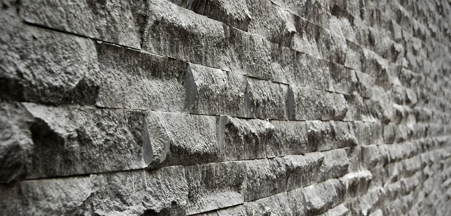 close up of a grey brick wall